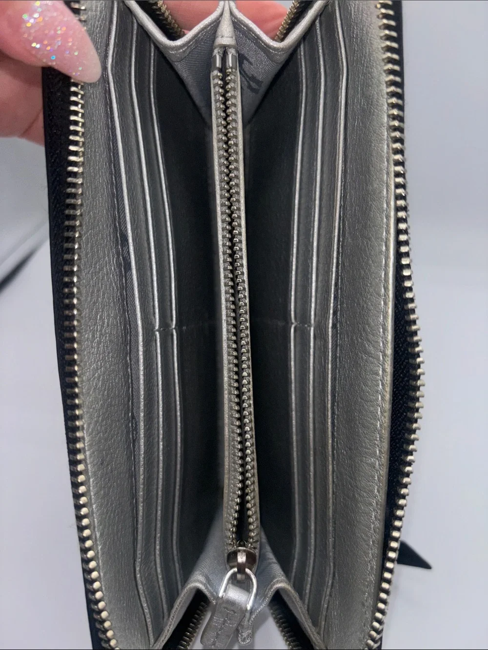 Tory Burch sleek zip
